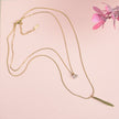 Elegant Gold-Tone Layered Necklace with Crystal Pendant