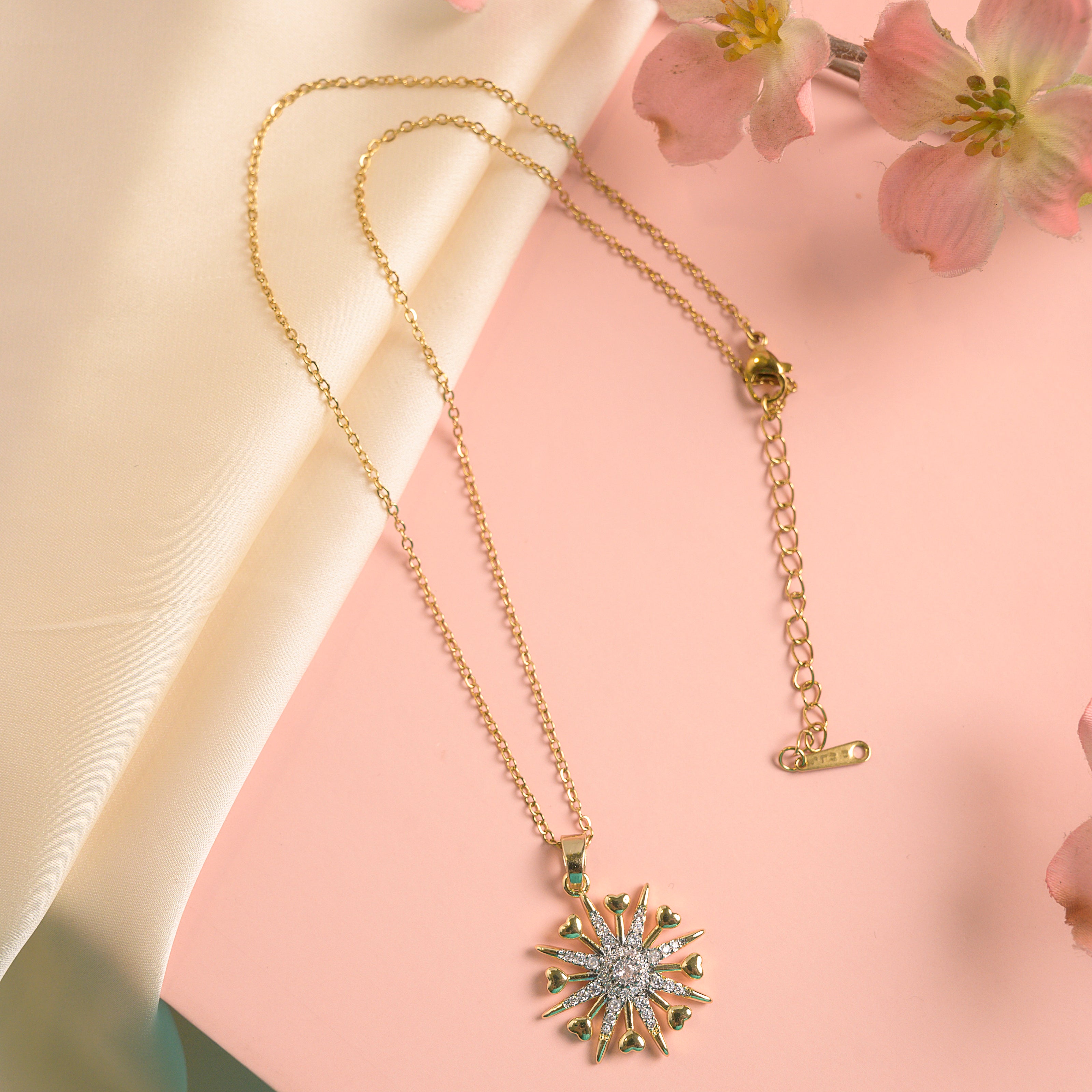 Elegant Gold-Tone Sunburst Pendant Necklace with Sparkling Crystal Stones