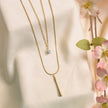Elegant Gold-Tone Layered Necklace with Crystal Pendant & Long Bar Charm
